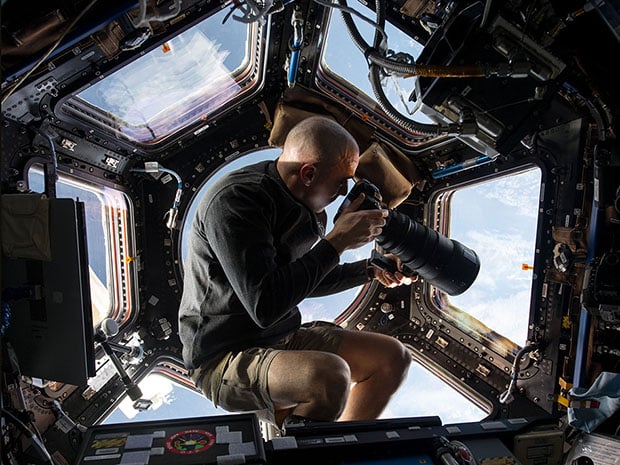 Photographing Earth from the Cupola on the International Space Station