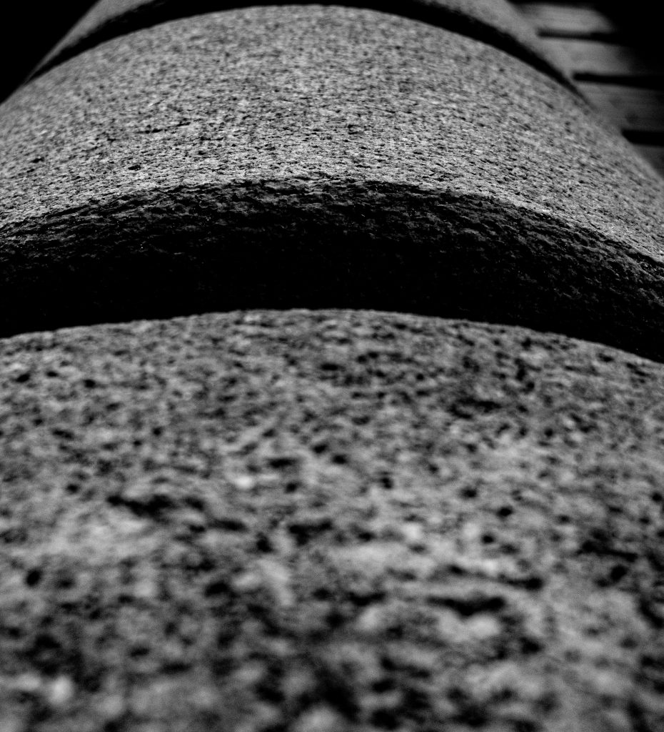 Detail of an architectural element on the front of a building on Front Street, Wilmington, NC.