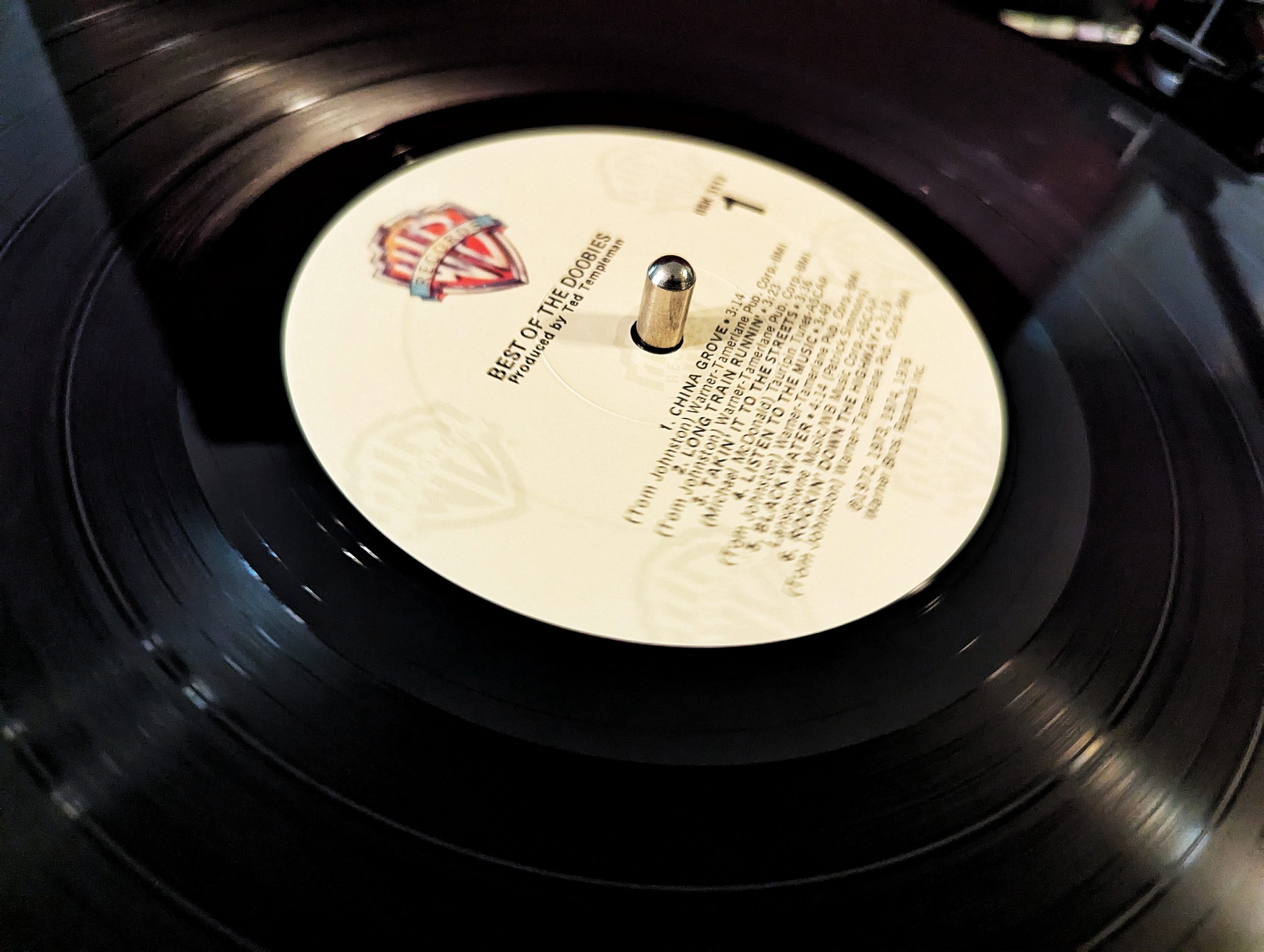 The Doobie Brothers vinyl album spinning on a record player.