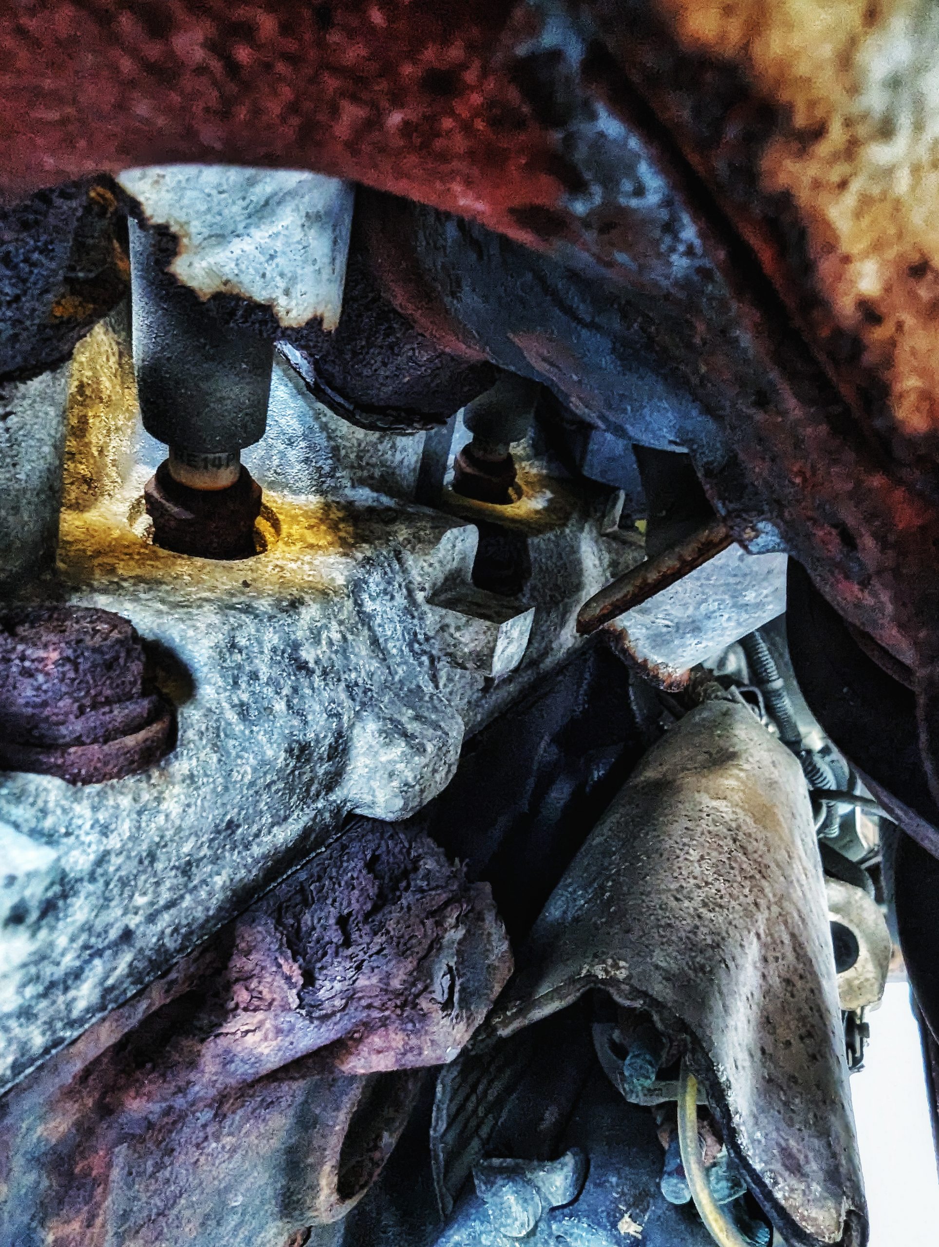 A view of the underside of an engine.