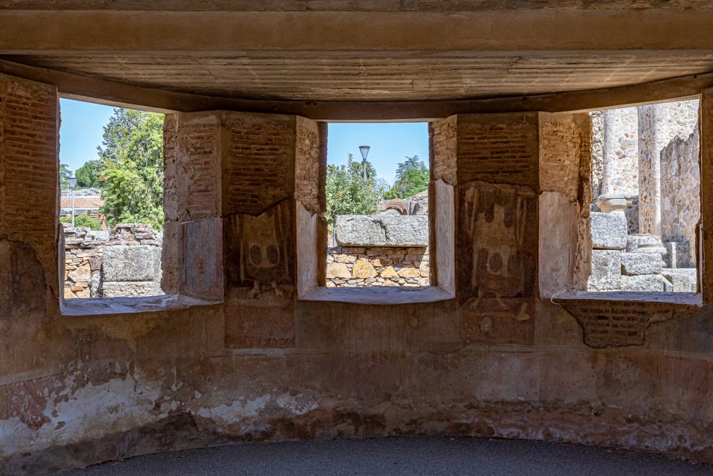 A view through the windows of a building in the ornamental gardens near the ancient Roman theater in Mérida, Spain.